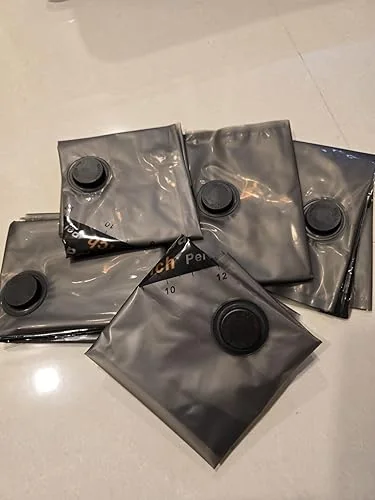 Foto de un cliente: bolsas al vacío comprimidas con la válvula visible